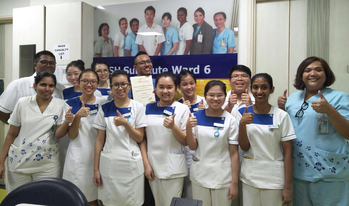 Ying Xi posing with her classmates during their clinical attachment