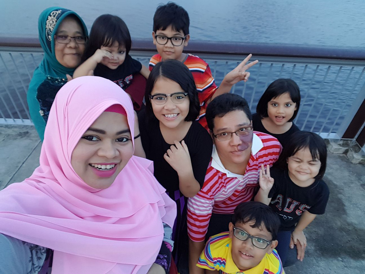 Ashirdahwani with her family and helper during an outing